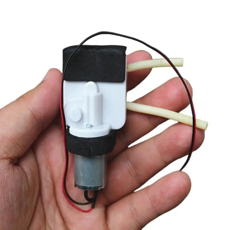 Micro peristaltic water pump with flow direction change