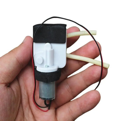 Micro peristaltic water pump with flow direction change