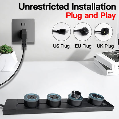 Power track outlet rail showing modular sliding sockets with USB-C and multiple adapters for US, EU, UK plugs