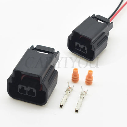 2-pin auto waterproof oil temp sensor connector FQGE-MT-284 2018610020 installed in engine showing secure wire harness connection