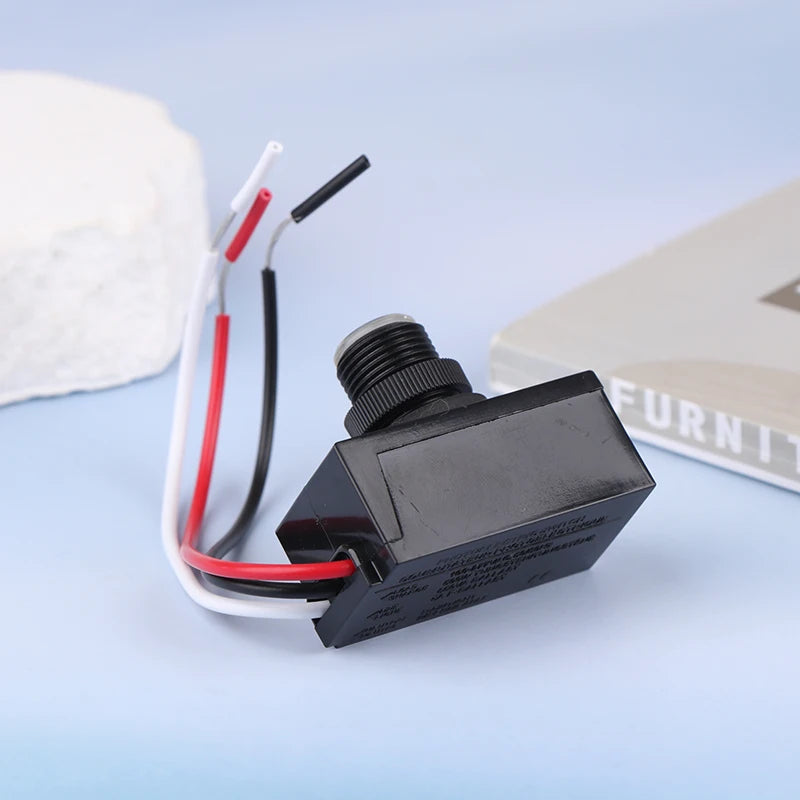 Outdoor photocell sensor switch for automatic street light activation