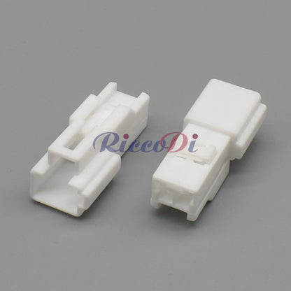 Demonstration of 2-pin connector fitting into vehicle parking sensor and electric seat harness