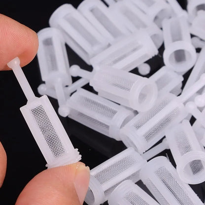 Replaceable fine mesh filter for spray gun