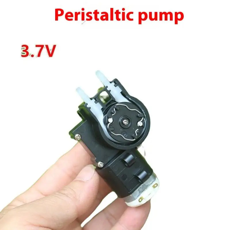 Reversible squeeze pump motor for liquid pumping