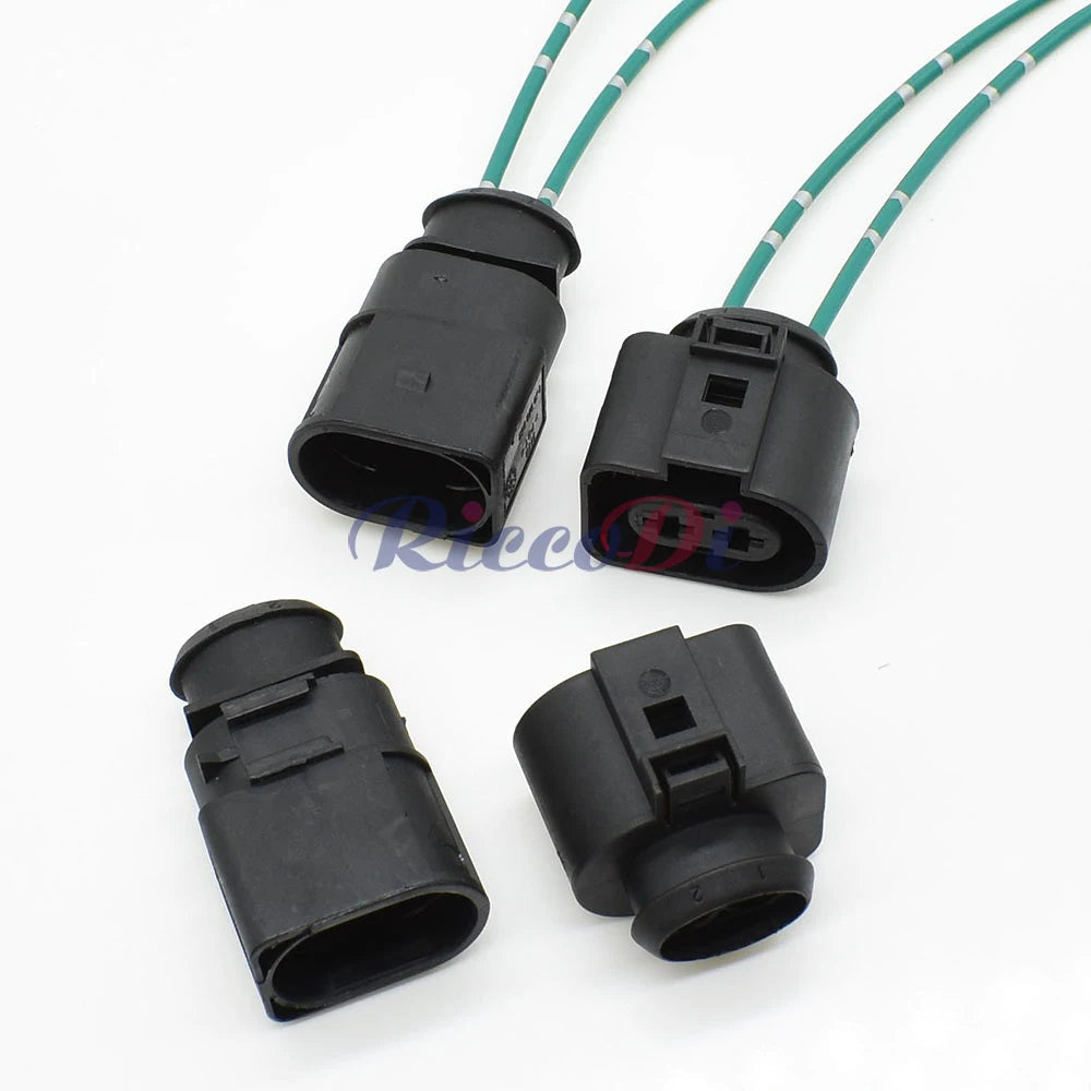 Sealed automotive cooling fan connector front view with male and female sockets