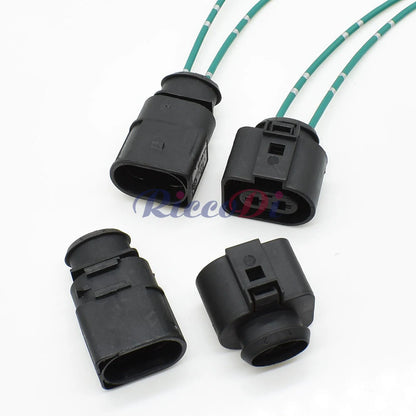 Sealed automotive cooling fan connector front view with male and female sockets