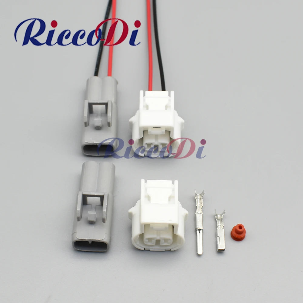Sealed automotive wiring harness connector with female plug socket and terminals for vehicle electrical systems