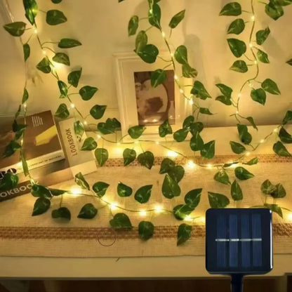 Set of 2026 solar vine string lights, 50/100/150 LED green fairy lights with pothos leaves for wedding, Christmas, and home wall decor