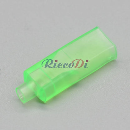 Green-sheathed 6.3mm spring terminal connected to wire in automotive push button switch harness
