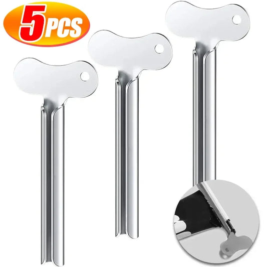 Stainless steel toothpaste squeezer with roller design