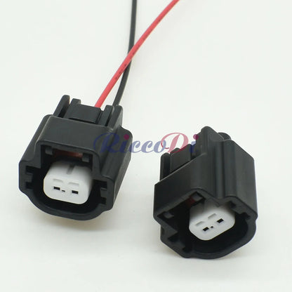 Detailed view of terminal structure for automotive temperature sensor connector ensuring stable electrical contact