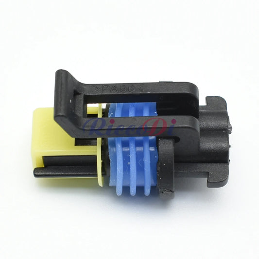 Close-up of 2 pin terminals for automotive turn signal and side lamp connector