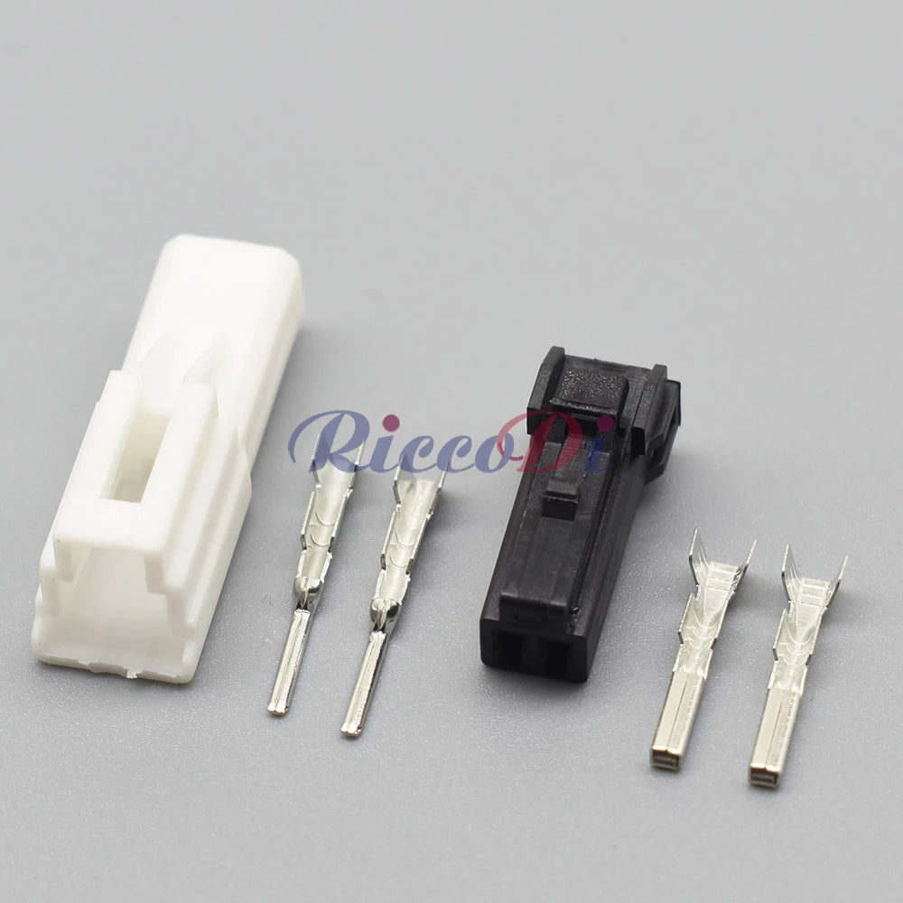 Close-up of automotive unsealed wire harness connector showing precise socket interface