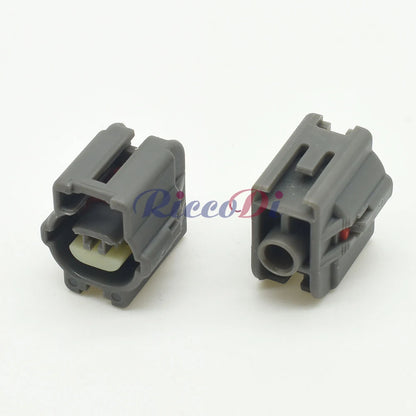 Automotive connector installed on motor shock sensor for reliable electrical signal transmission in vehicles