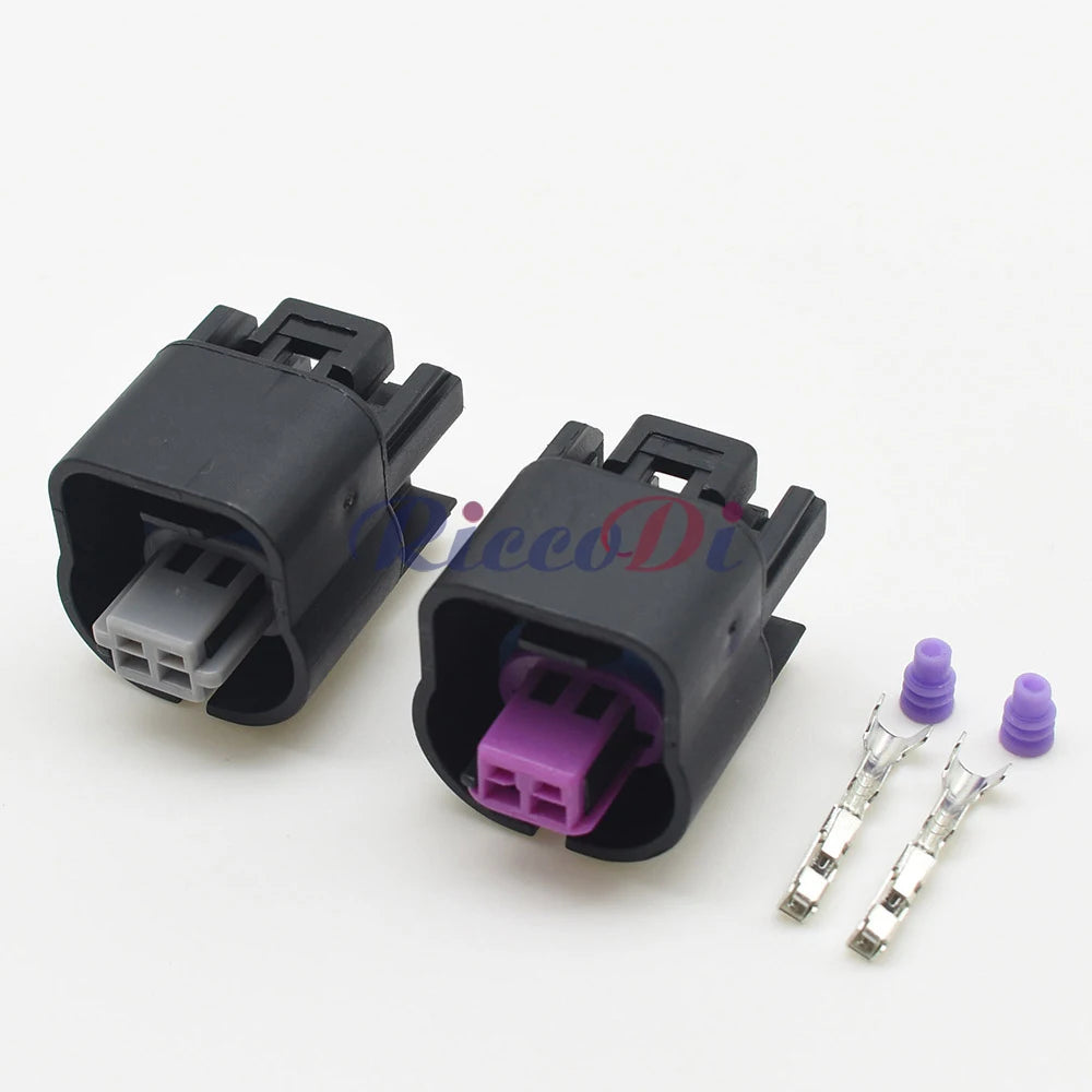 Close-up of terminals for 2 pin centerline automotive connector for camshaft VVT solenoid valve