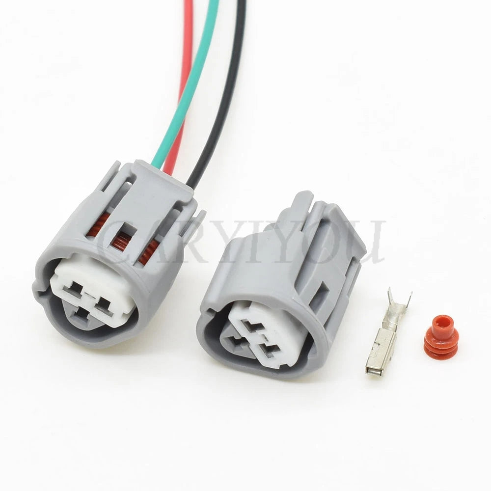 3-Pin female automotive water temperature sensor connector 6189-0486 installed in Toyota wiring harness showing secure socket plug connection