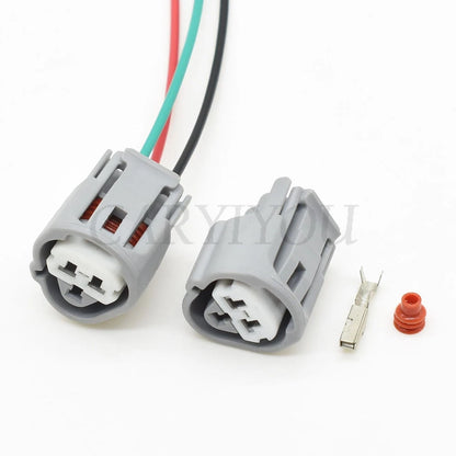3-Pin female automotive water temperature sensor connector 6189-0486 installed in Toyota wiring harness showing secure socket plug connection