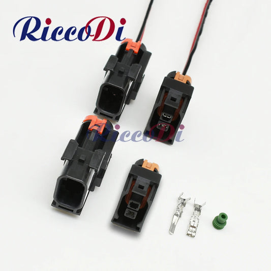 Waterproof automotive electrical connector with male plastic housing plug
