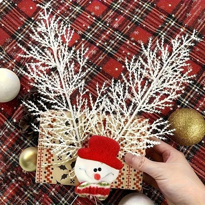 Close-up of white fake pine needles branches for Christmas and DIY crafts