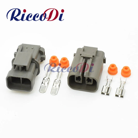 Close-up view of heavy current automotive wire connector showing secure male and female socket interface