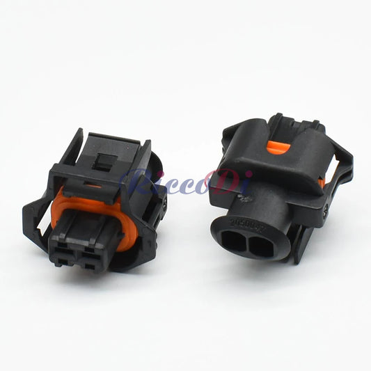 Close-up view of automotive wire harness connector showing precise socket interface for secure wiring